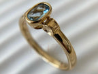 Oval Aquamarine Ring - Yellow Gold Bezel | Briza Jewel