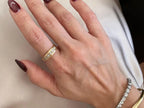 Gold Diamond Wedding Ring worn on hand showing its elegant everyday style
