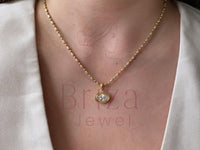 Elegant diamond pendant set in gold from Briza Jewel