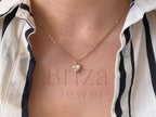 Elegant diamond pendant set in gold from Briza Jewel