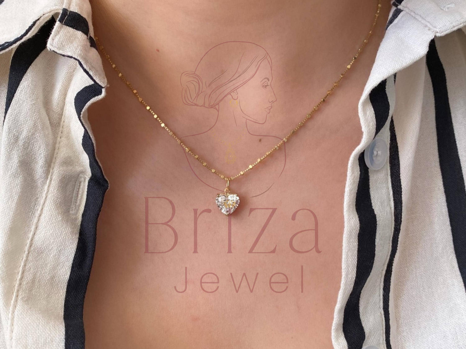 Elegant diamond pendant set in gold from Briza Jewel