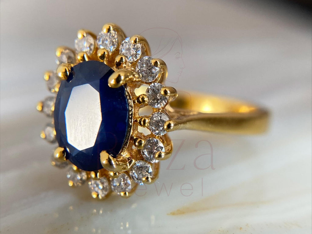 sapphire ring with halo design by Briza Jewel