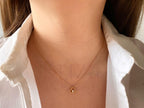 Gold diamond necklace with minimal design by Briza Jewel