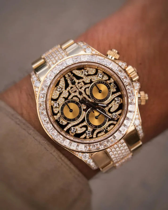 Luxury watch with intricate design and diamond accents on a wrist.