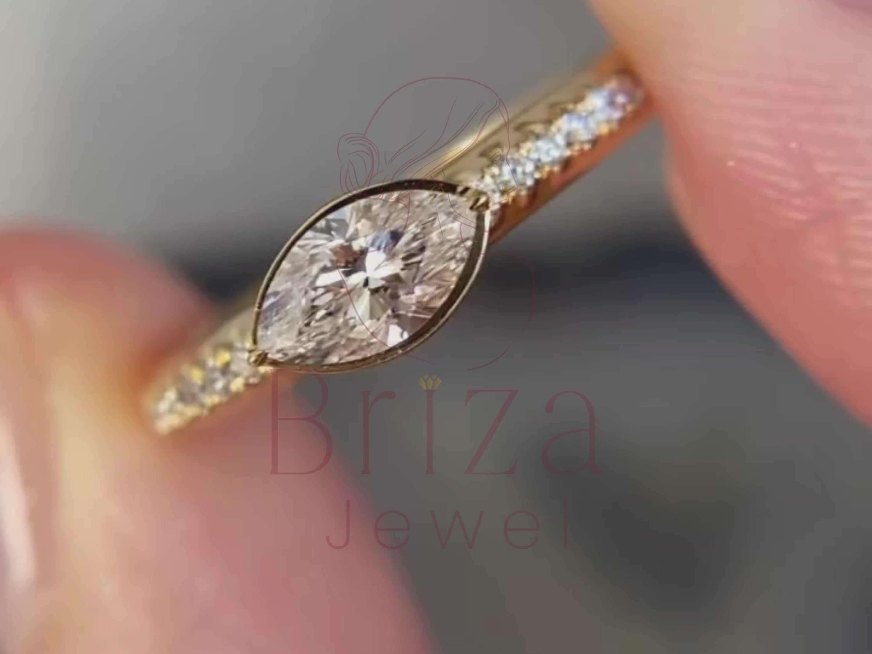 marquise cut diamond ring close-up showing pavé setting detail