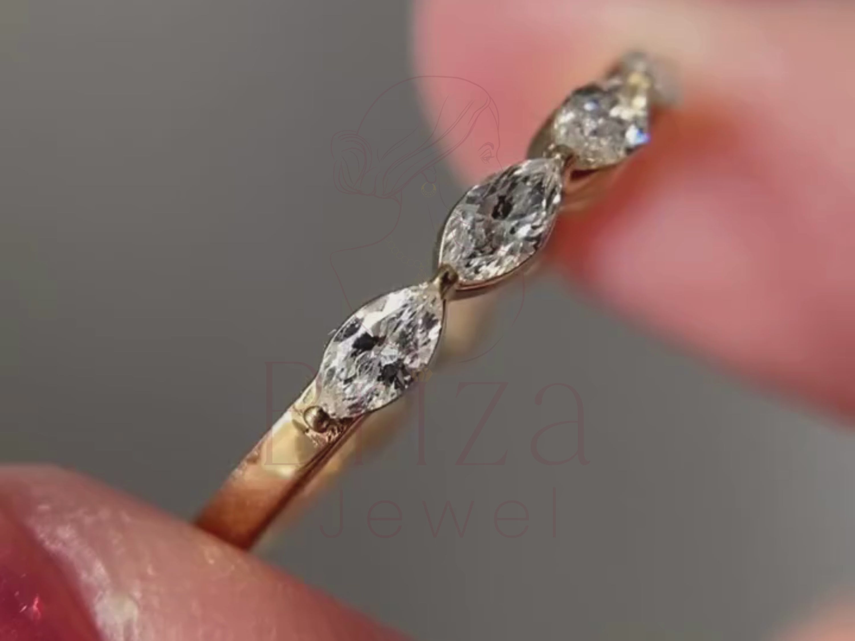 marquise cut engagement ring close-up showing elongated center stone