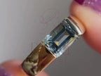 lab grown emerald cut diamond close-up showing blue moissanite detail
