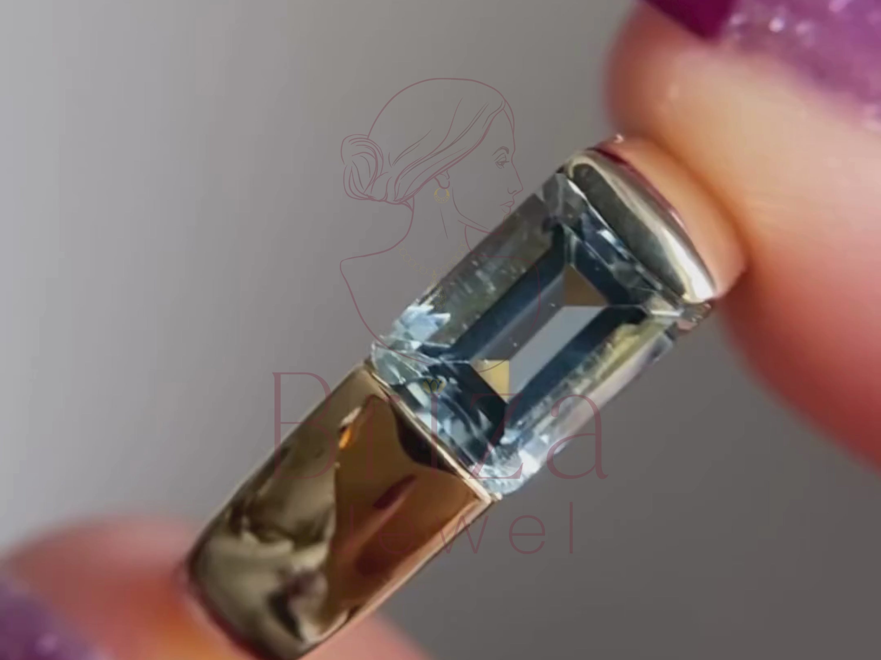 lab grown emerald cut diamond close-up showing blue moissanite detail