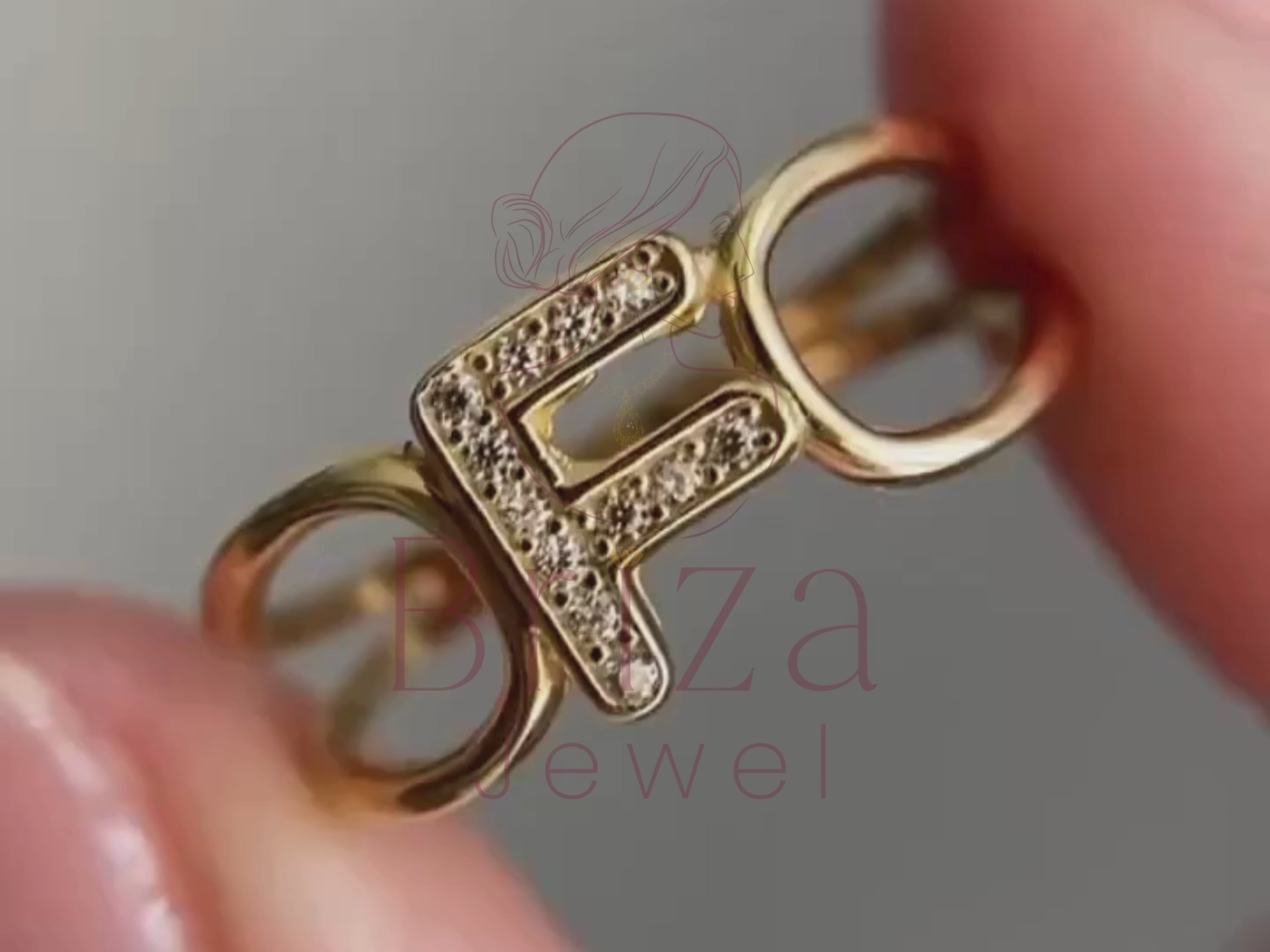 f color diamond ring close-up showing adjustable gold band