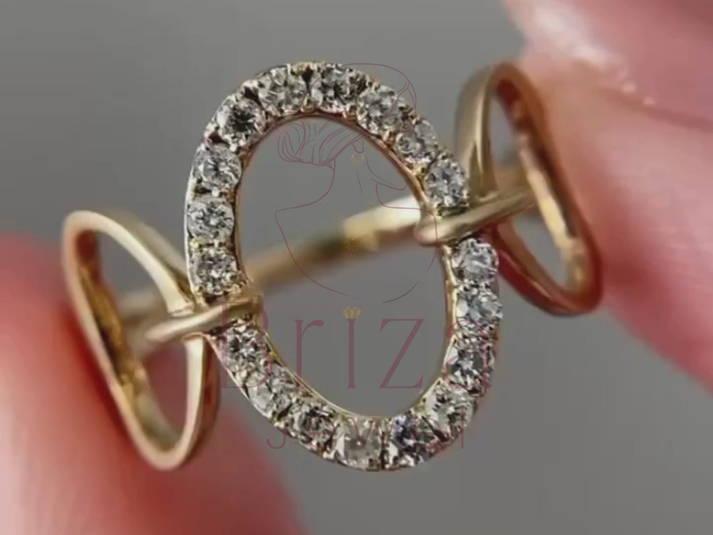 open oval ring close-up showing geometric diamond detailing