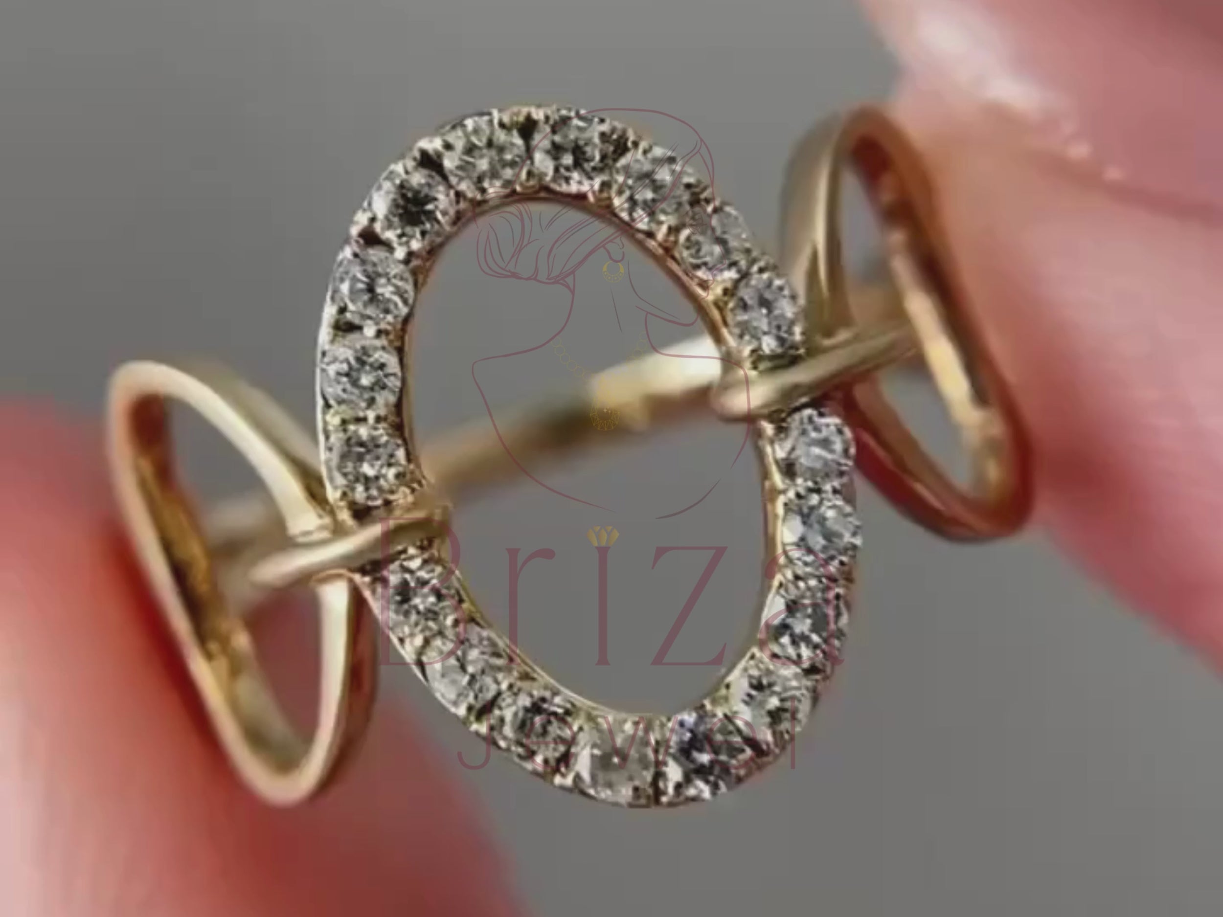 open oval ring close-up showing geometric diamond detailing