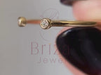 gold stacking ring close-up showing lab diamond detail