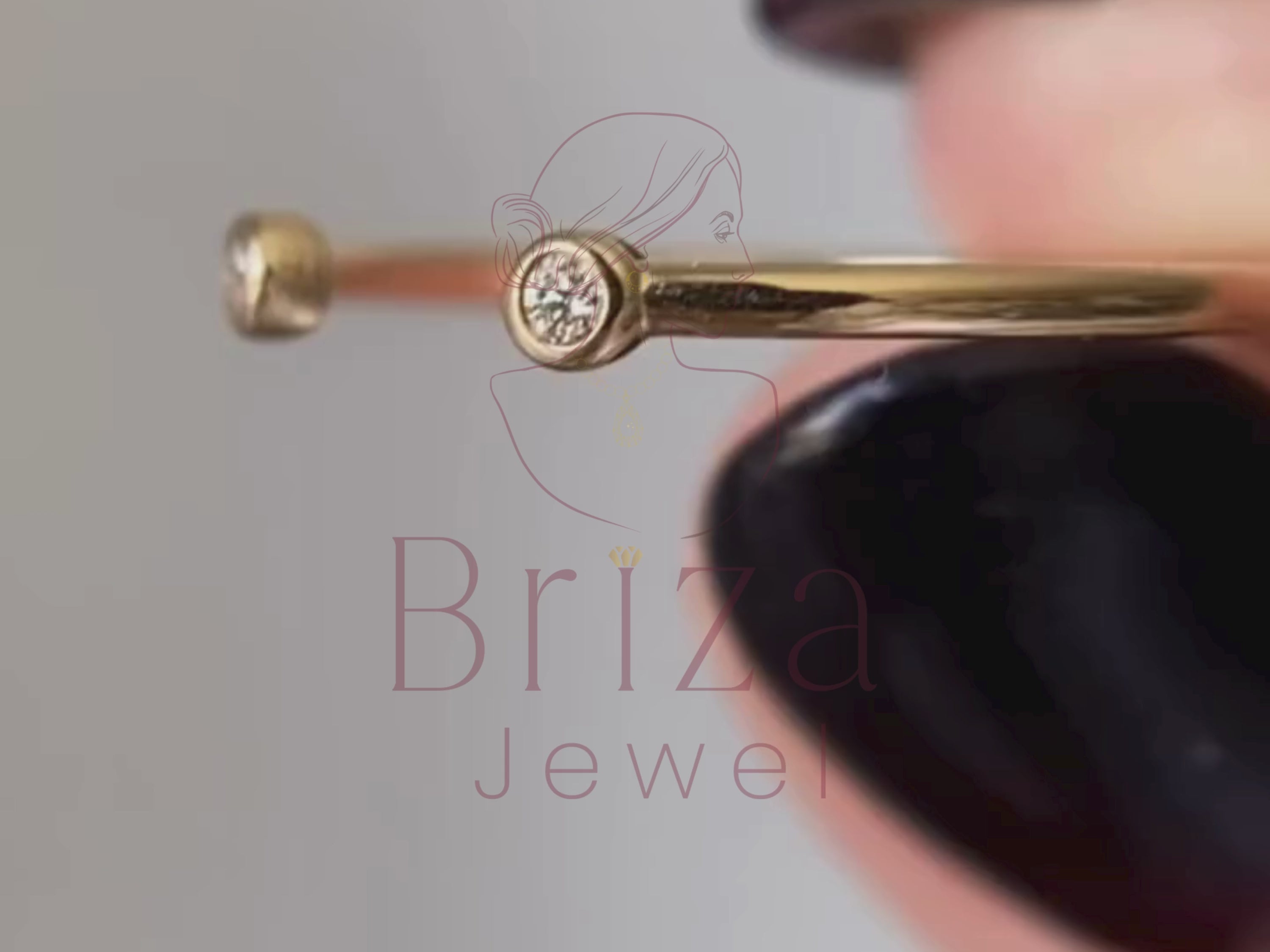 gold stacking ring close-up showing lab diamond detail