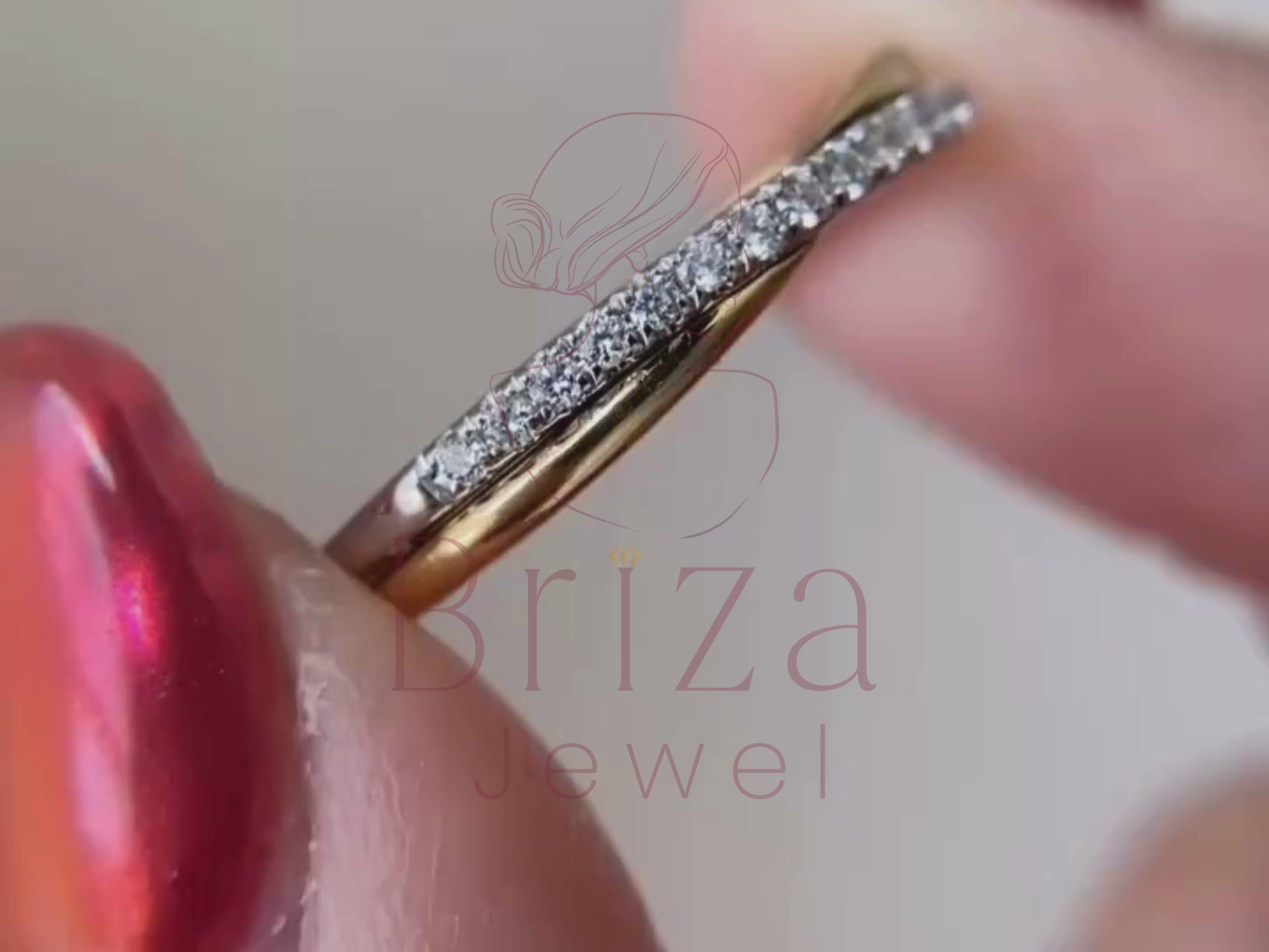 two tone engagement ring close-up showing pavé detailing