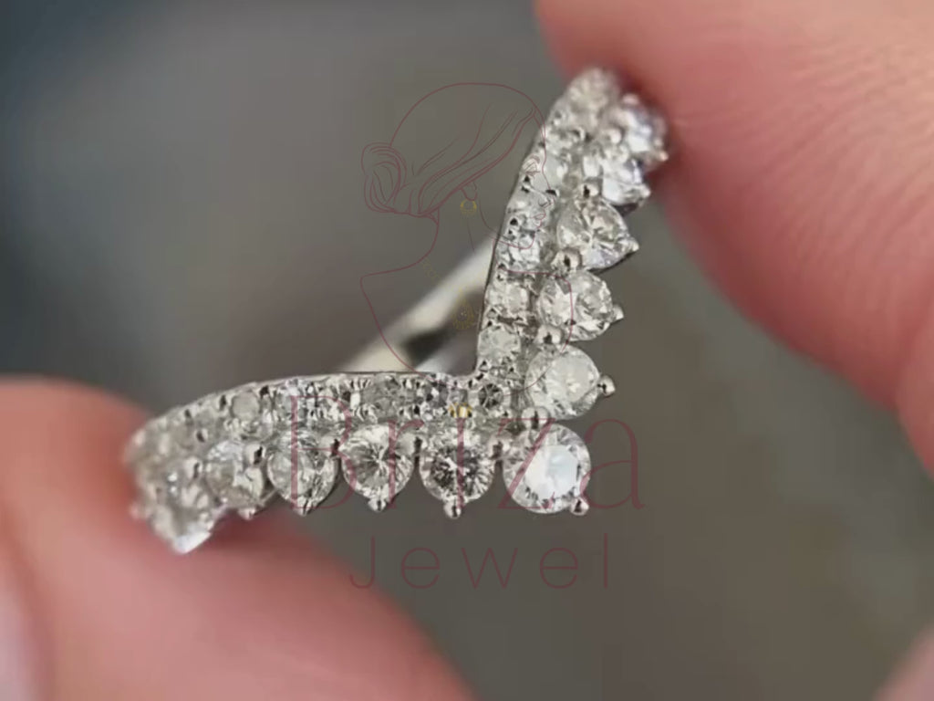 chevron engagement ring close-up showing curved diamond detailing