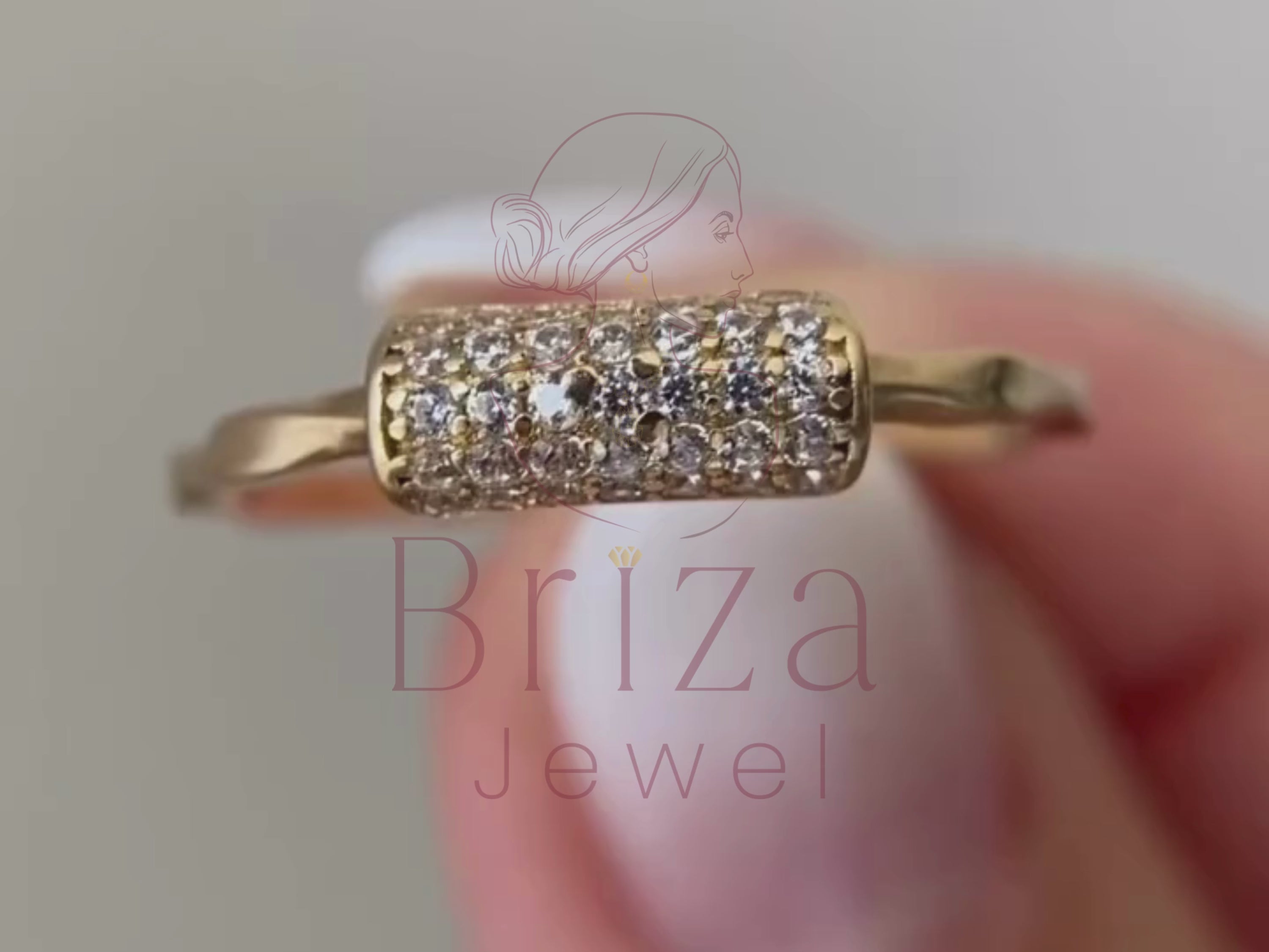 serpent ring close-up showing diamond-set detailing