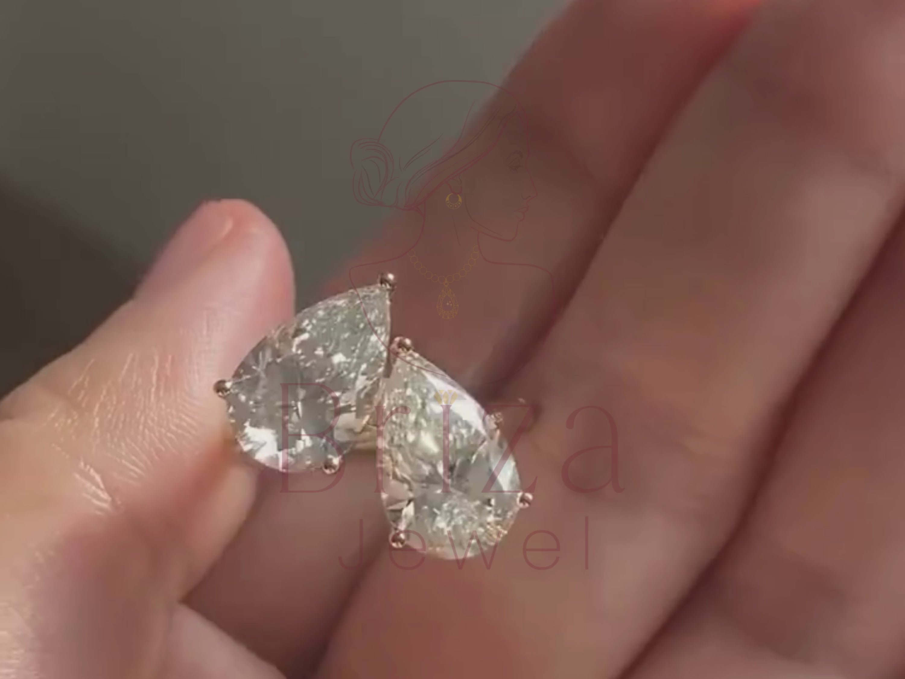 toi et moi ring close-up showing paired pear stone design