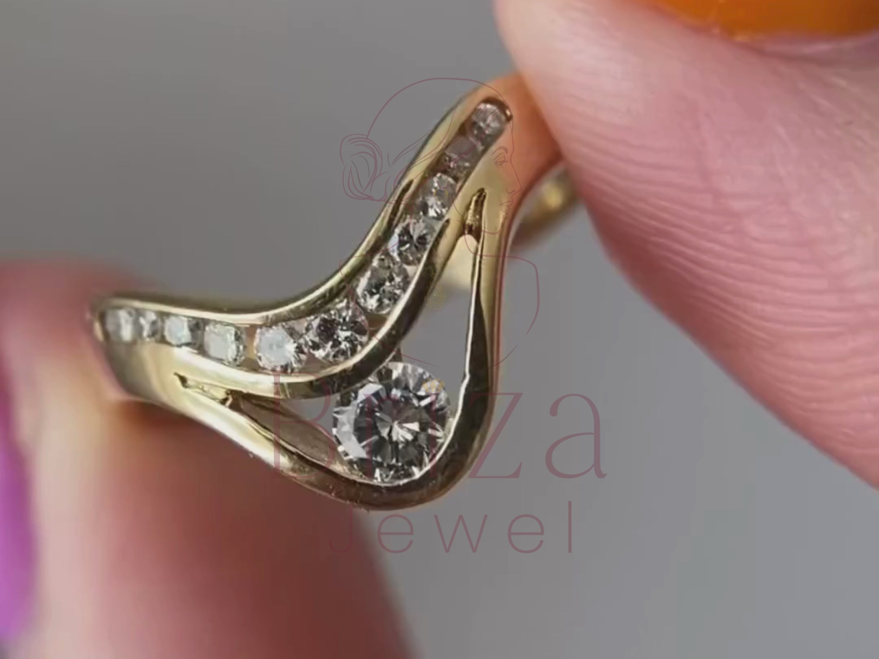 diamond promise ring close-up showing chevron setting