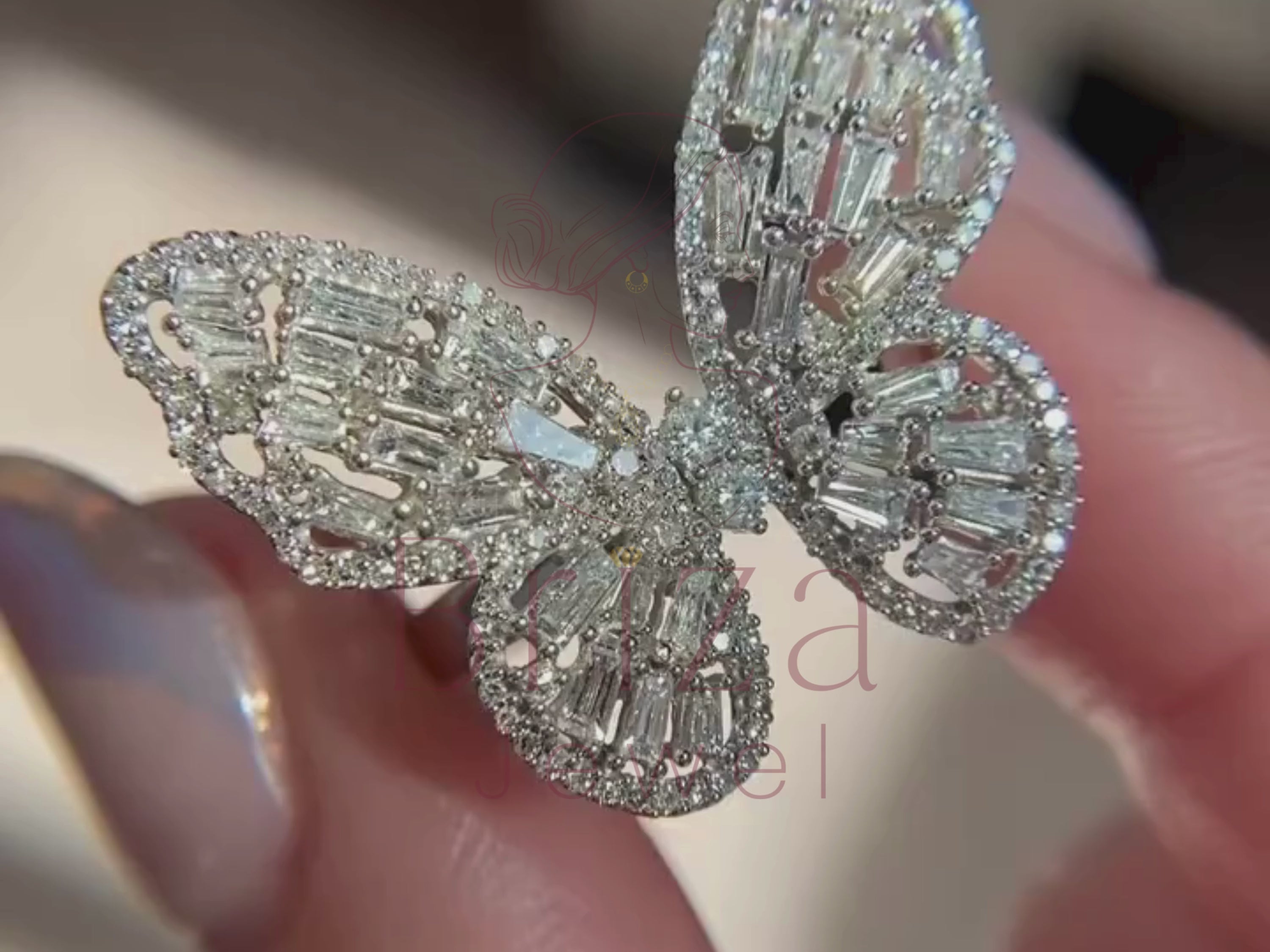 butterfly diamond ring close-up showing baguette stones