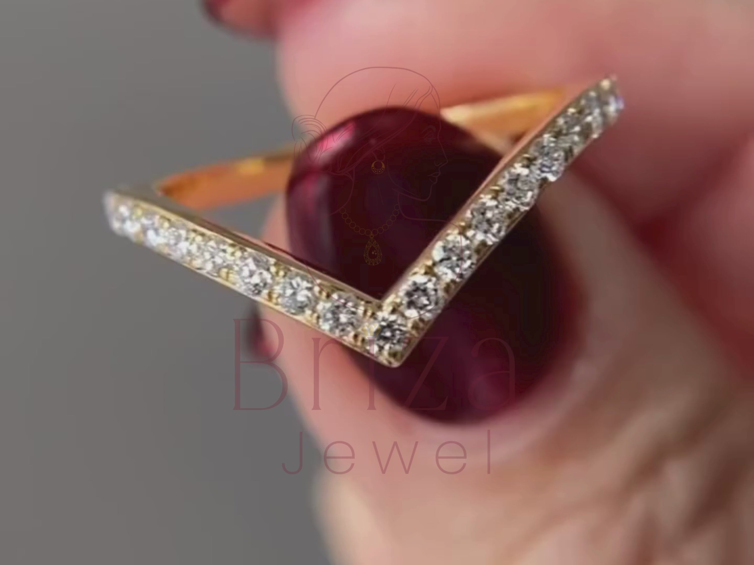 V shaped wedding band close-up showing chevron detail