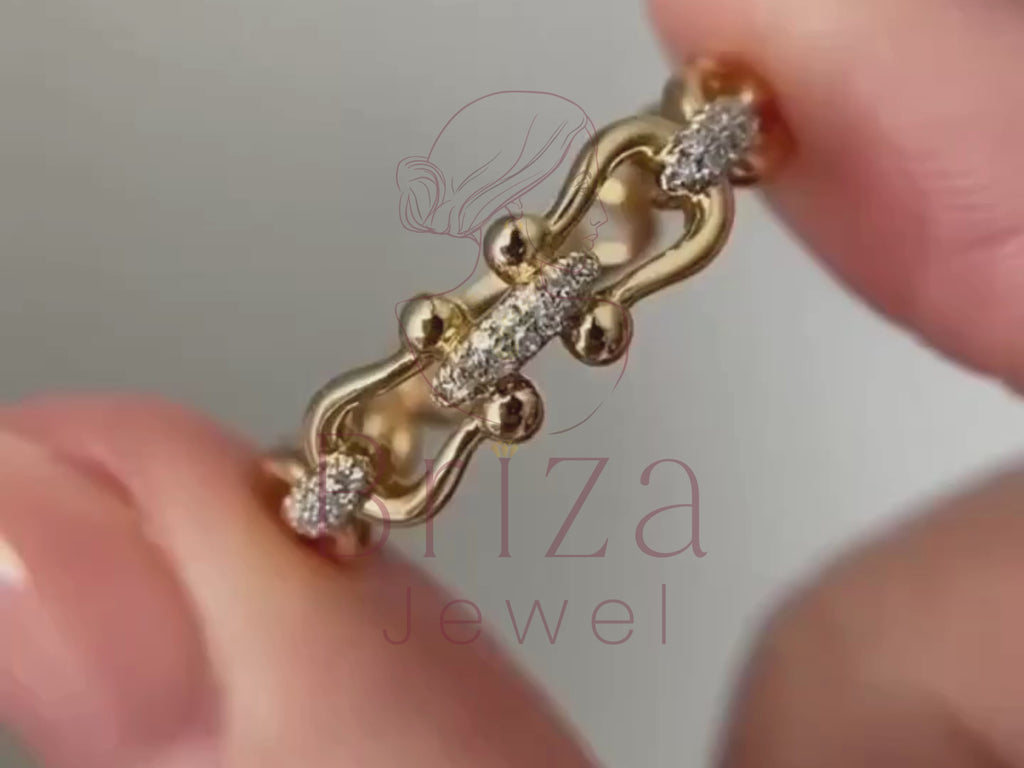 elegant diamond ring close-up showing chain link diamond detail