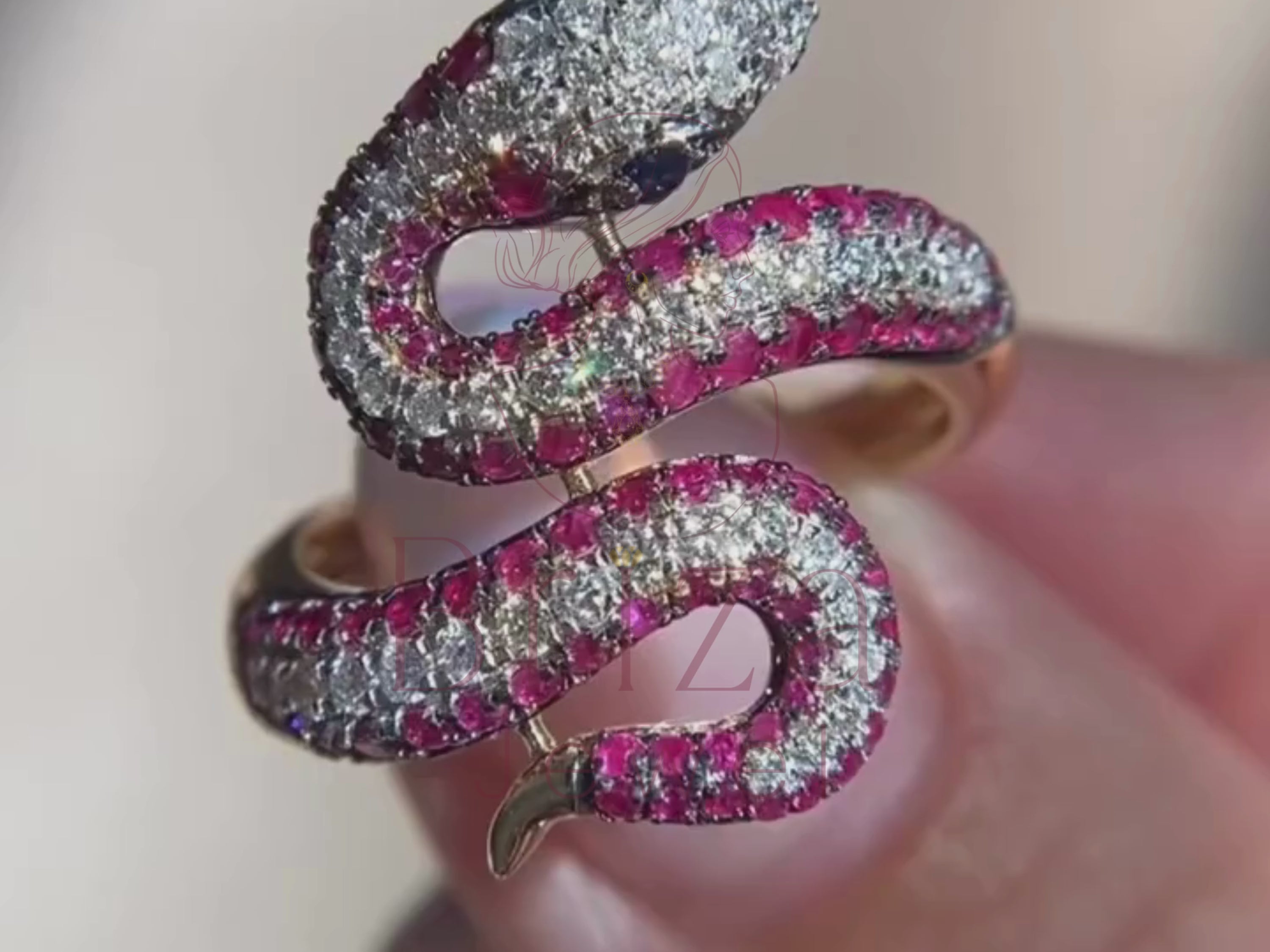 gold snake ring close-up showing moissanite diamond detailing