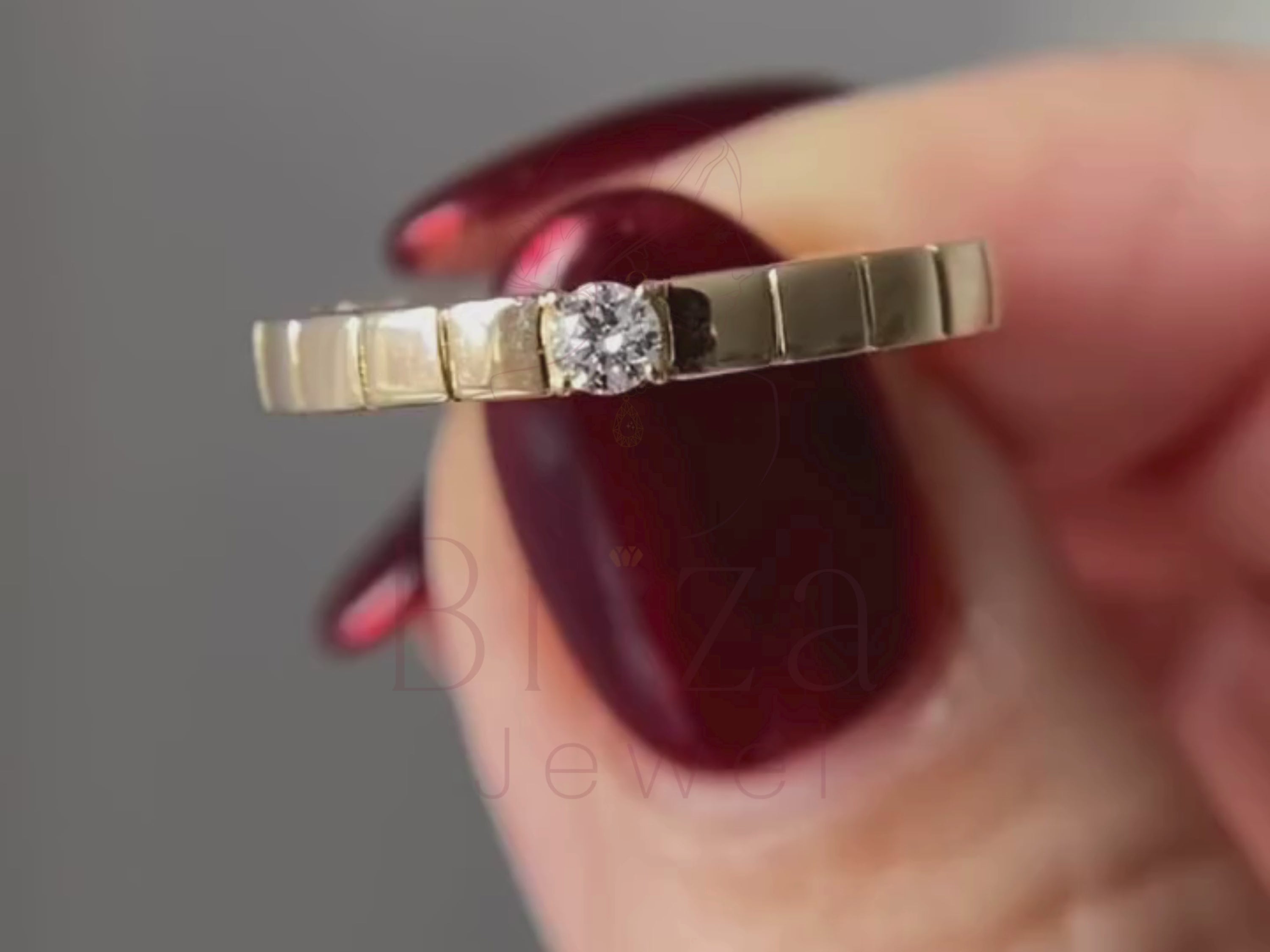 unisex wedding band close-up showing moissanite solitaire detail